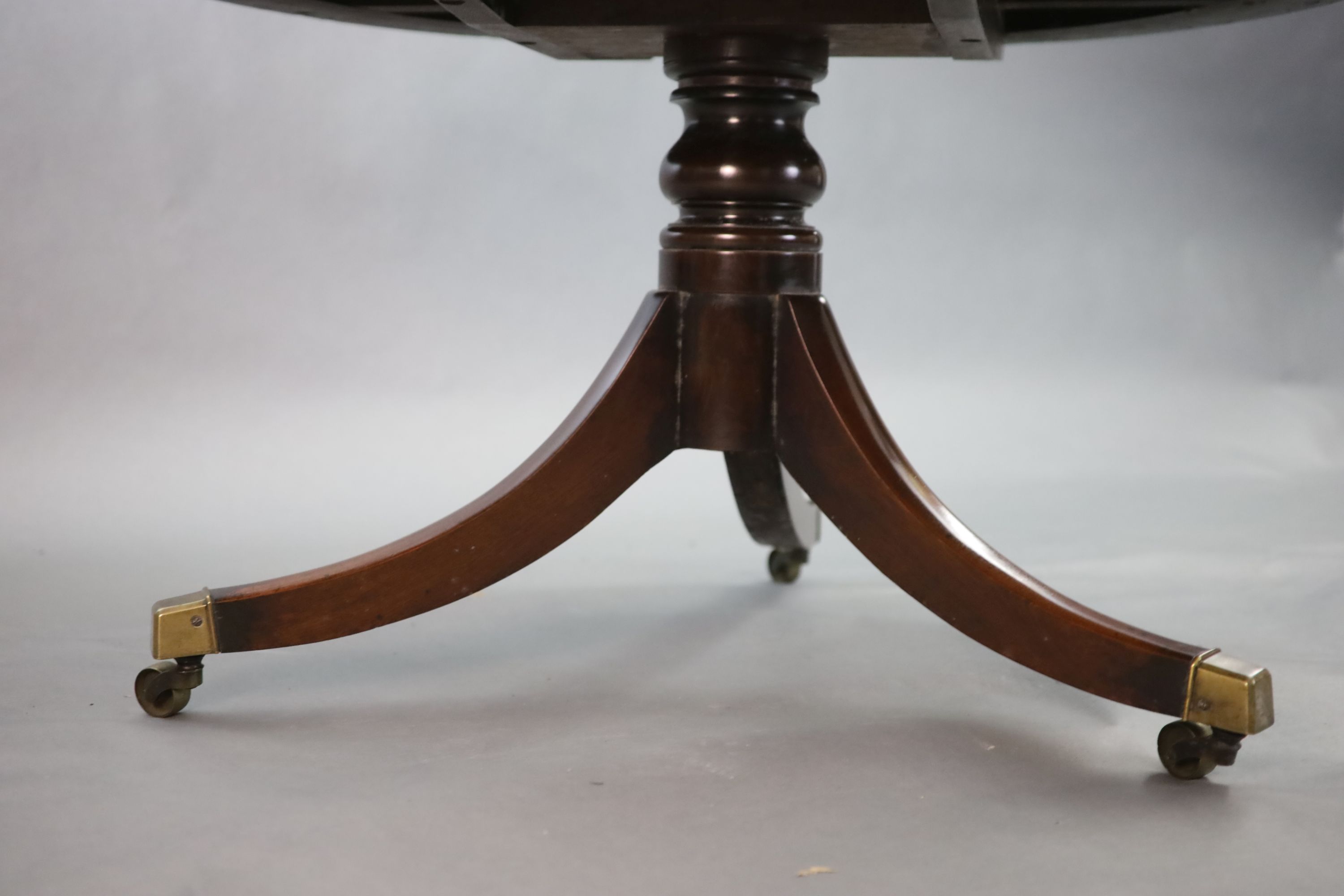 A Regency mahogany drum top library table,